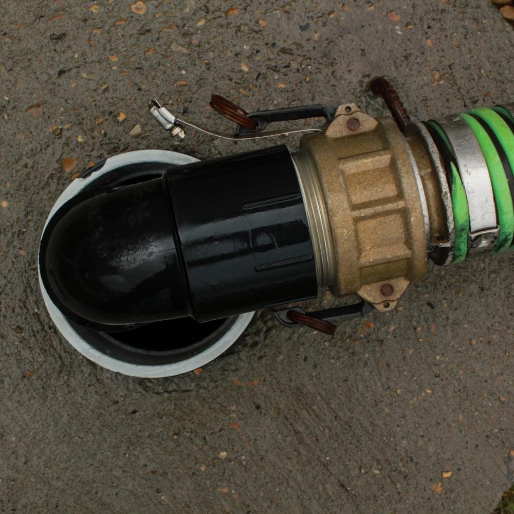 Septic tank hose connected during a septic tank cleaning service